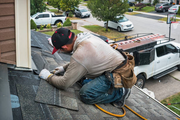 Professional Emergency Roof Repair technician working in Brookline, MA